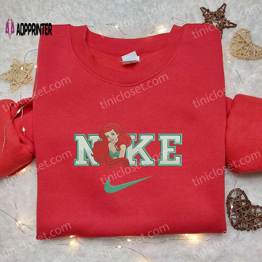 Ariel x Nike Cartoon Embroidered Shirt: Unique Little Mermaid Inspired Nike Tee Ariel x Nike Cartoon Embroidered Shirt: Unique Little Mermaid Inspired Nike Tee